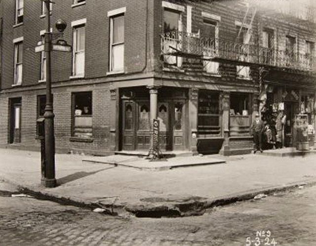 "Spring Street, Looking northeast from corner of West Street. Savannah Hotel, Lunch & Restaurant. May 3, 1924."